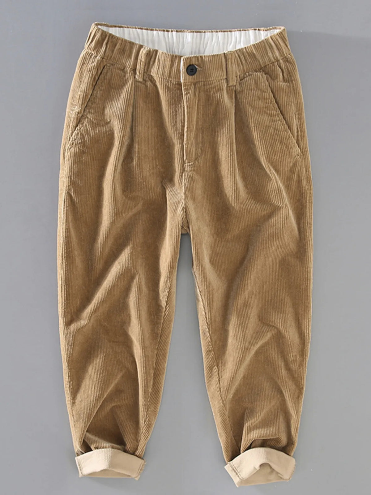 Front view of beige corduroy jogger pants with elastic cuffs by Northvale.