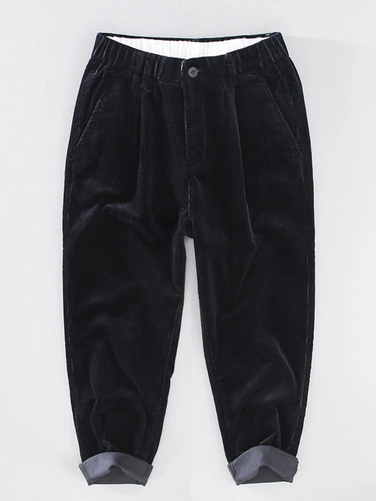 Front view of black corduroy jogger pants with elastic cuffs by Northvale.